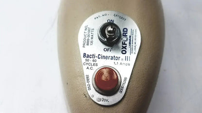 Silver labeled control panel on beige oxford labware bacti-cinerator iii sterilizer for laboratory use