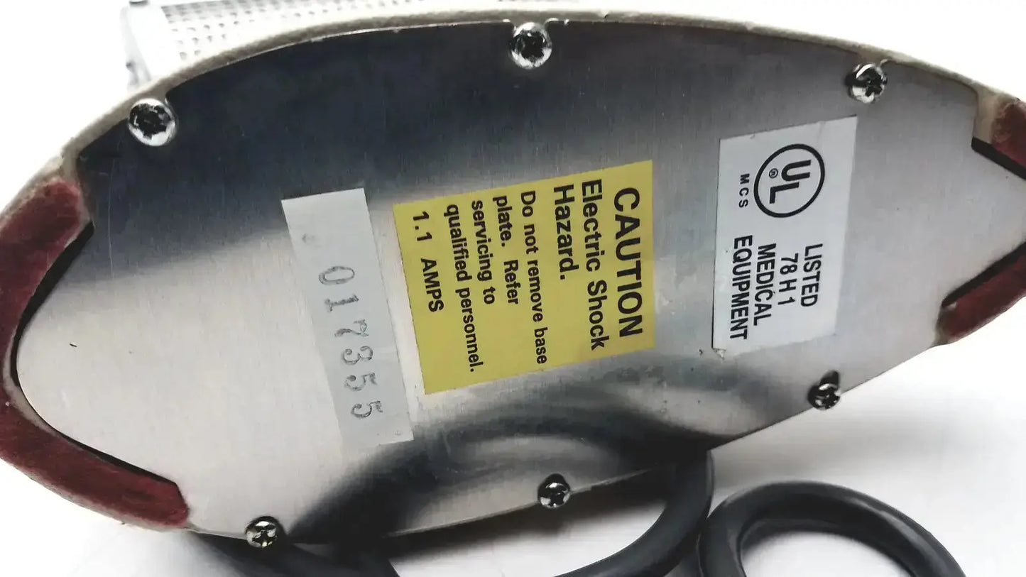 Silver metallic oxford labware iii sterilizer with red rubberized edges and warning labels bacti-cinerator iii sterilizer