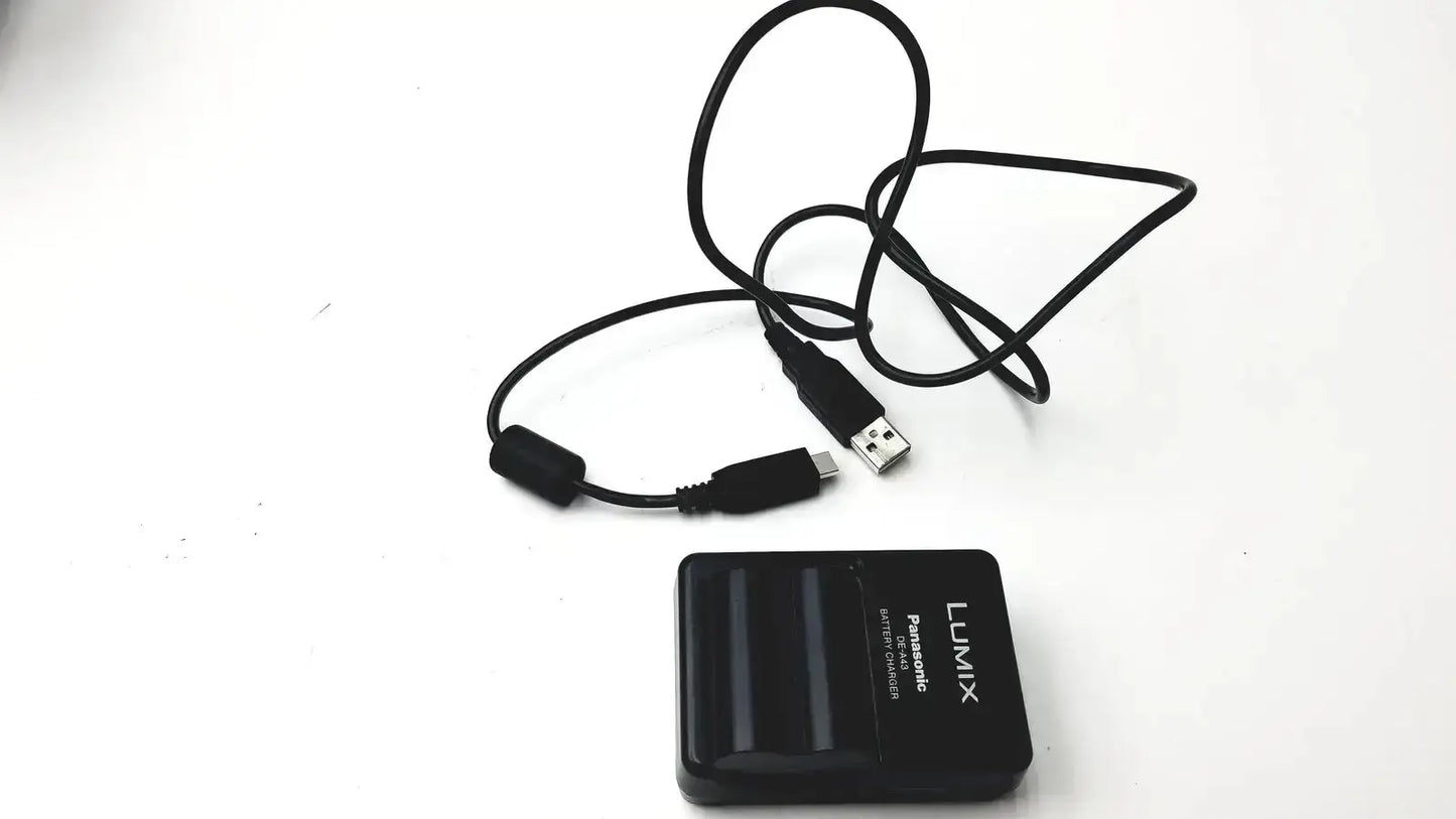 Black Panasonic Lumix DE-A43 battery charger with coiled USB cable for Panasonic model DMC-FZ35 digital camera