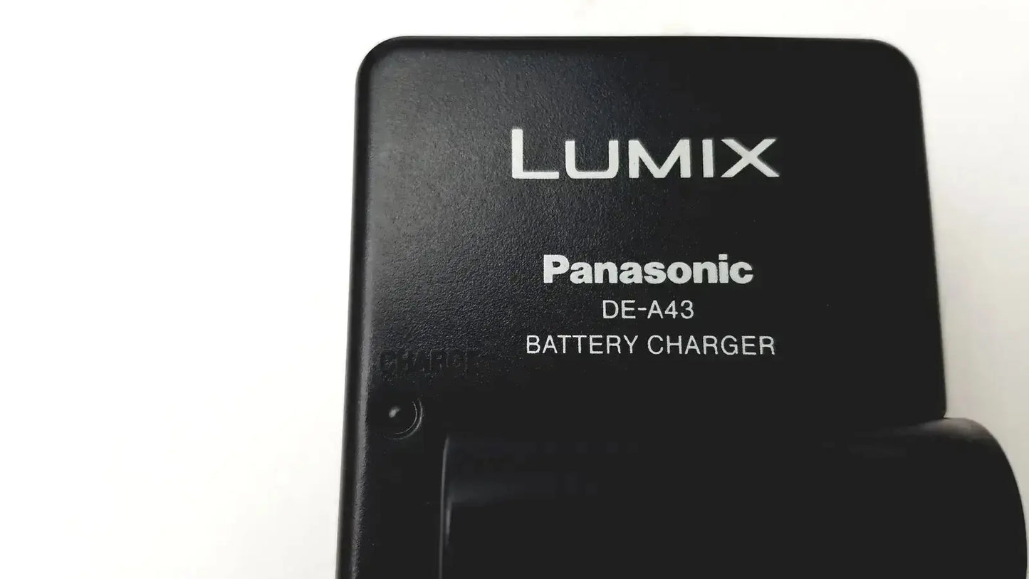 Black Panasonic Lumix DE-A43 battery charger with matte finish and white lettering for Panasonic model DMC-FZ35 digital camera