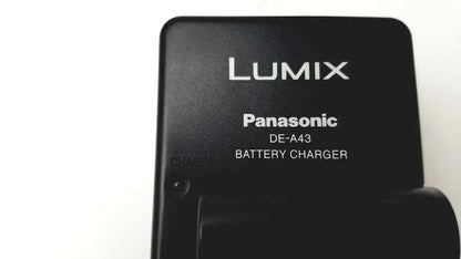Black Panasonic Lumix DE-A43 battery charger with matte finish and white lettering for Panasonic model DMC-FZ35 digital camera