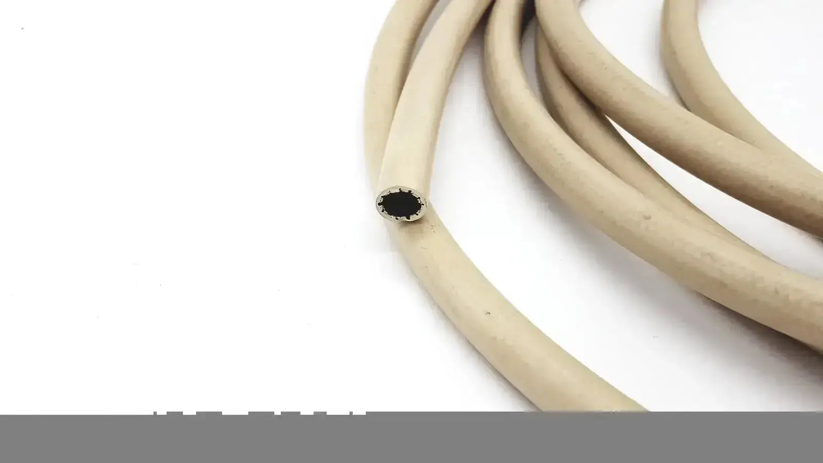 Beige parker 5159-4 electrically conductive hose with rubber coating and metallic inner core with exposed end
