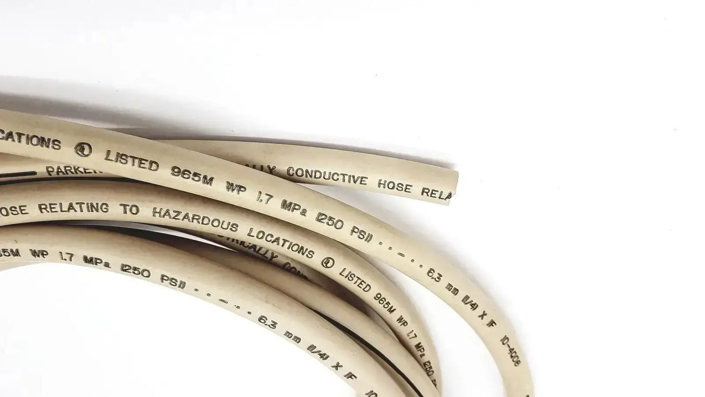 Beige parker 5159-4 electrically conductive hose with black printed specifications and adapter visible
