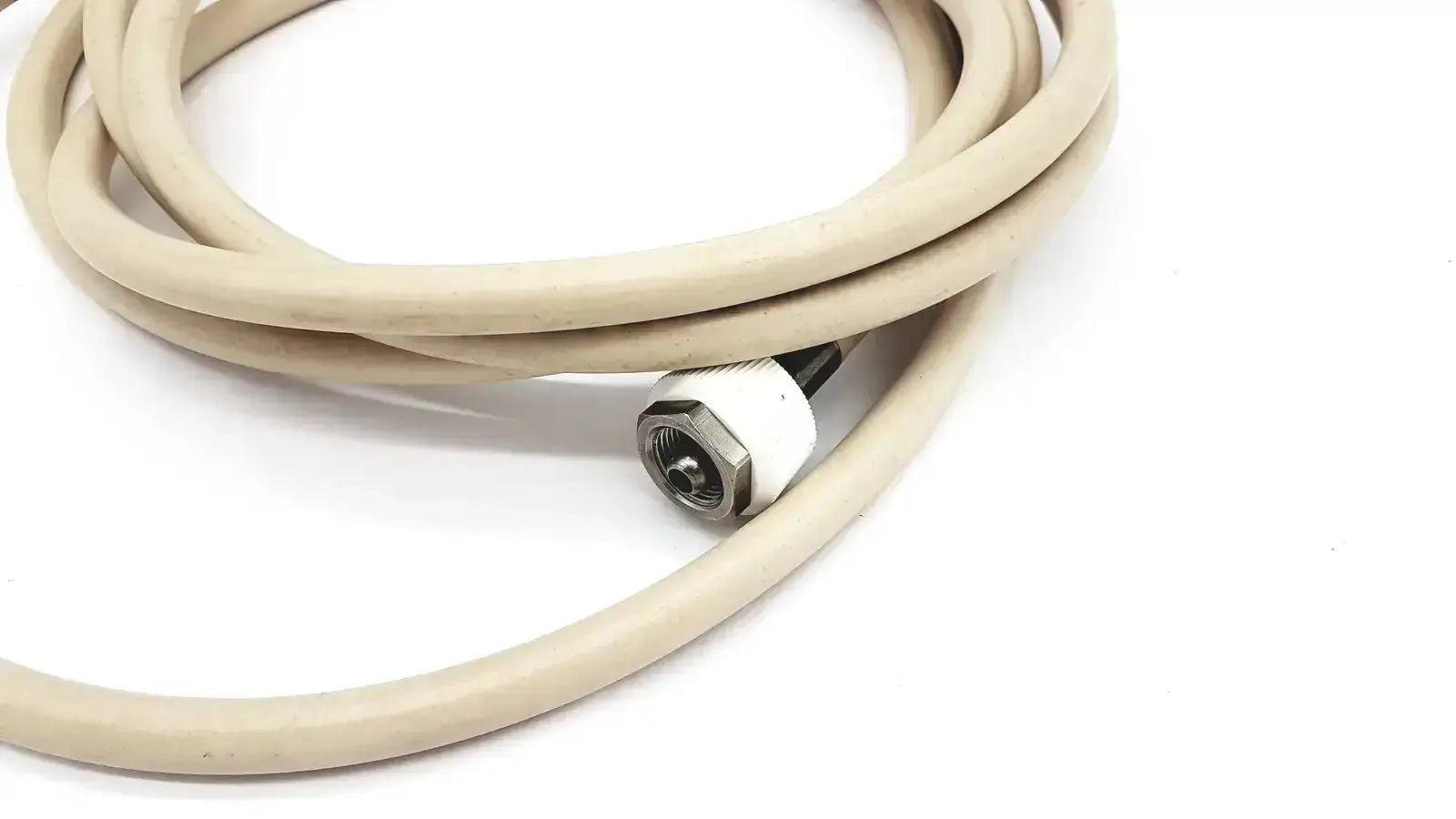 Beige coiled electrically conductive hose with white and metallic adapter for electrical applications parker 5159-4