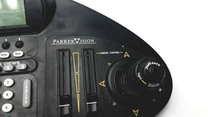 Black parker vision JSC-2100 camera man shot director controller panel with yellow markings and labeled pan tilt zoom focus dials
