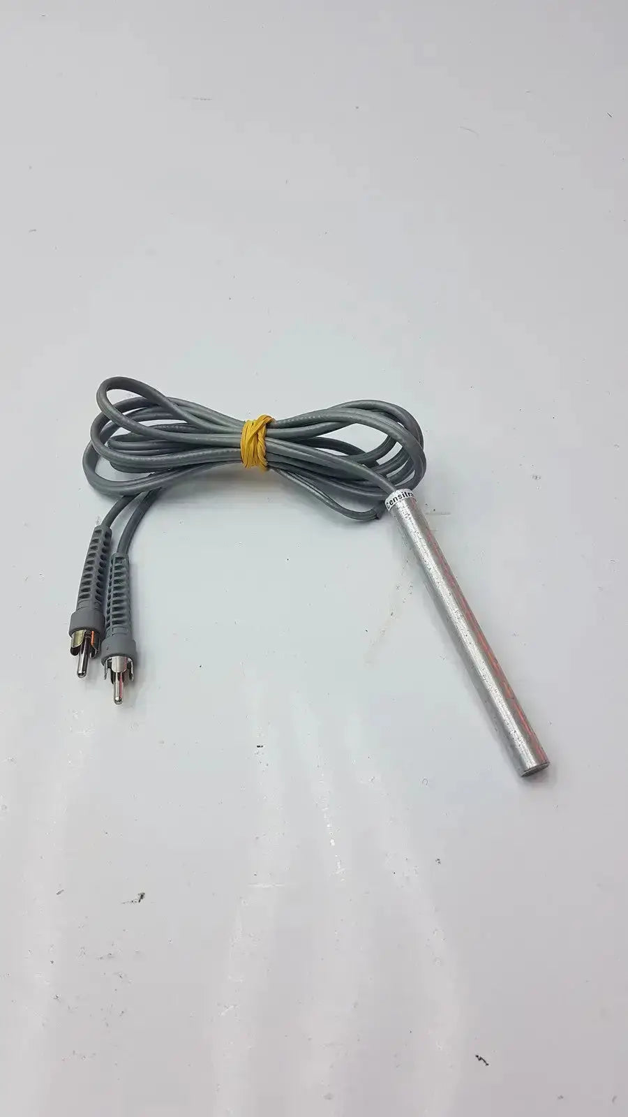 Gray coiled pencil doppler probe with yellow tie and rca connectors by parks medical electronics 8.1 mhz