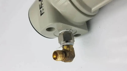 Beige plastic filter housing with brass and silver threaded valve assembly for peak scientific a20rac e361rac model