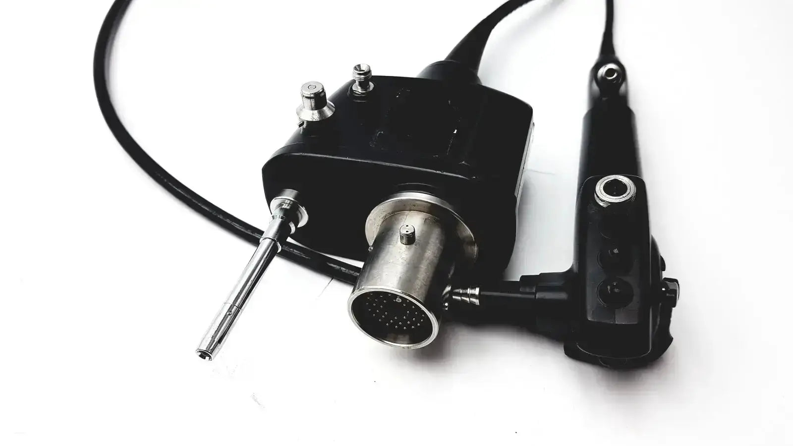 Black and silver pentax eb 1570k bronchoscope endoscopy endoscope with cylindrical lens housing connected by cables to control unit