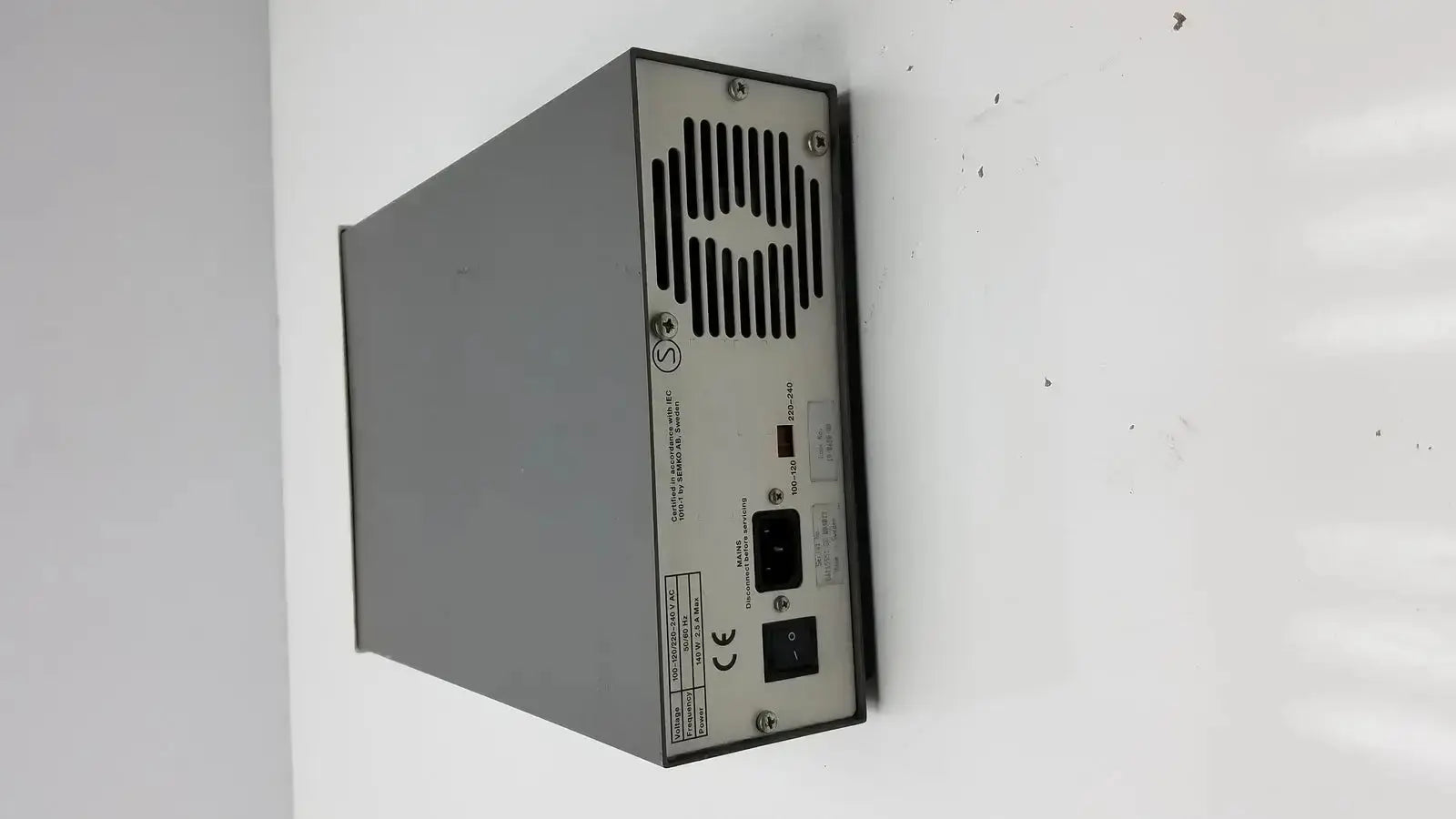 Gray metal electrophoresis power supply with ventilation slits and labeled ports pharmacia biotech eps 600 back view
