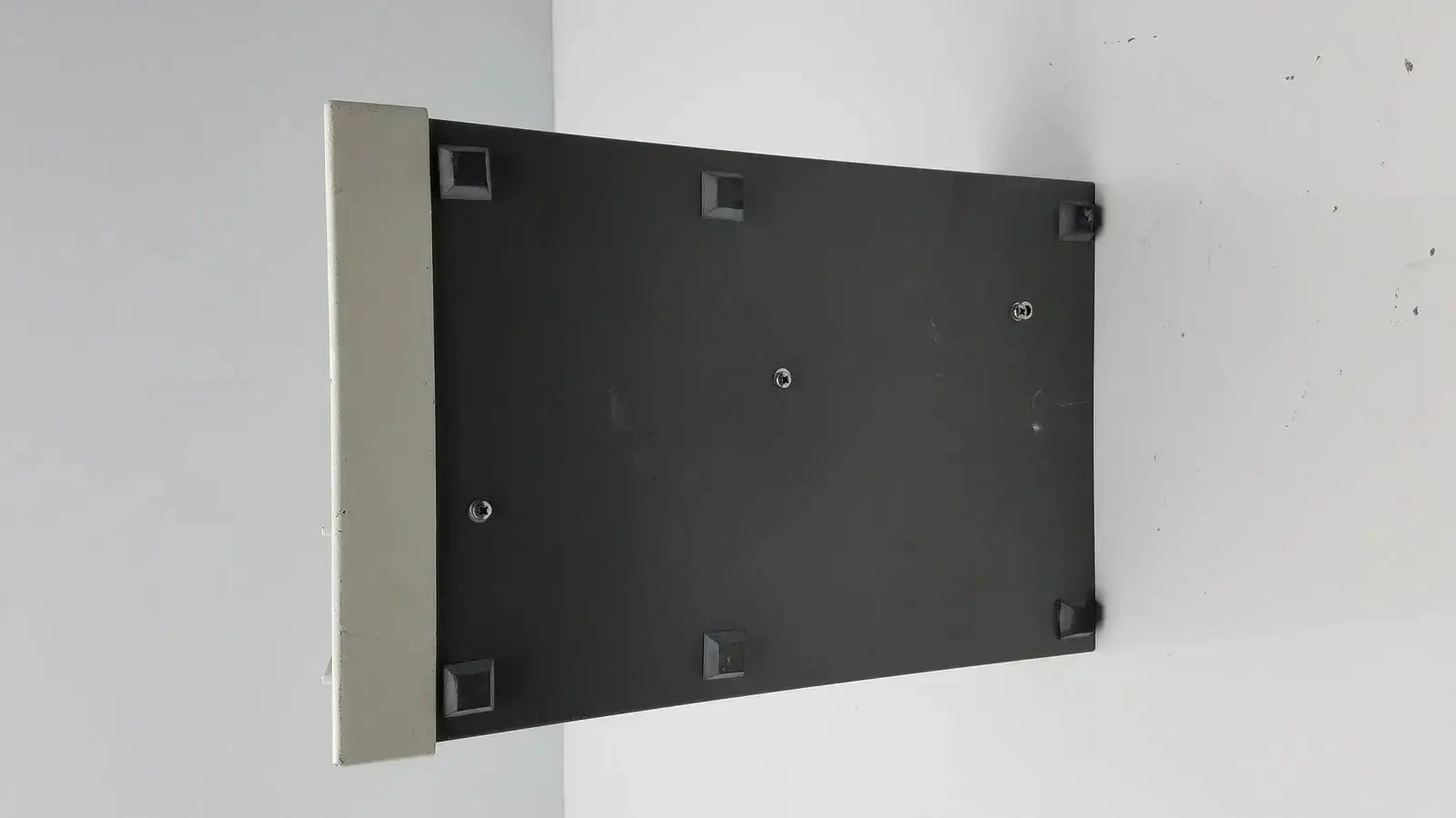 Black rectangular electrophoresis power supply with silver metallic side panel and four black feet pharmacia biotech eps 600