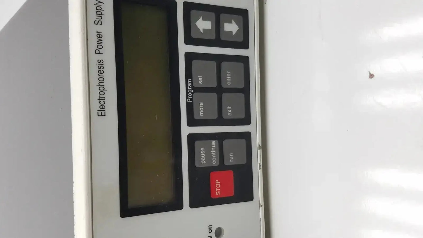 White Pharmacia Biotech EPS 600 electrophoresis power supply with black control panel red stop button and labeled keys