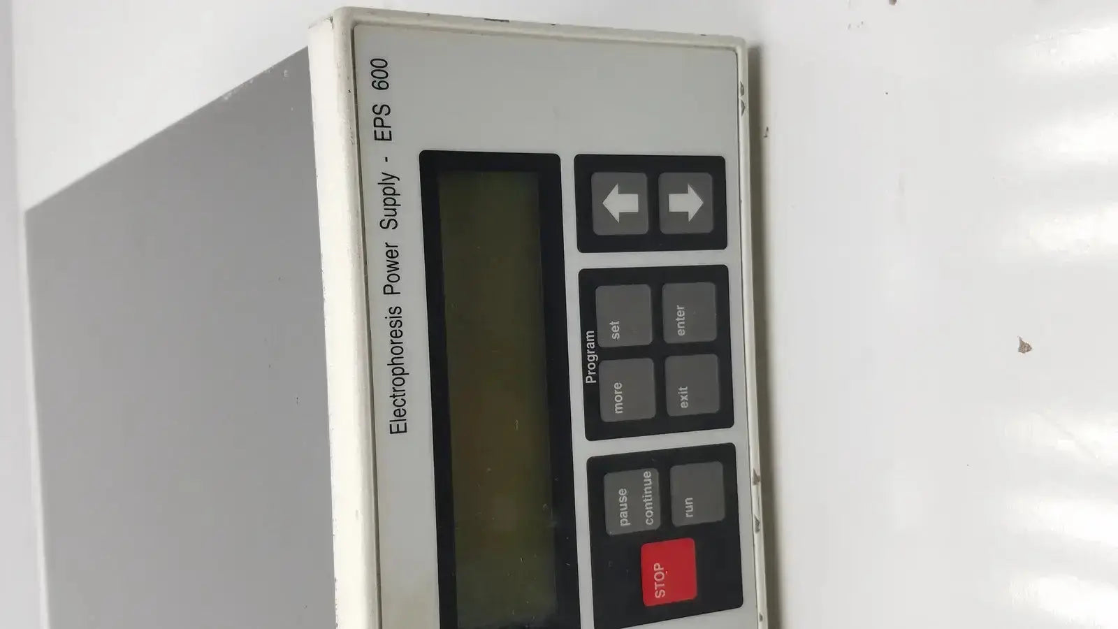 Gray rectangular Pharmacia Biotech EPS electrophoresis power supply with black buttons and digital display EPS 600 model