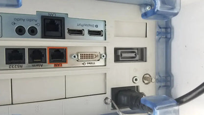 Beige plastic panel with ethernet hdmi and dvi ports on the back of philips intellivue mx700 bedside patient monitor