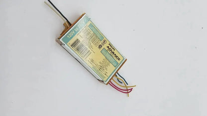 Philips advance smartmate icf-2s42-m1-ld fluorescent ballast with beige and green label and multi-colored wires visible