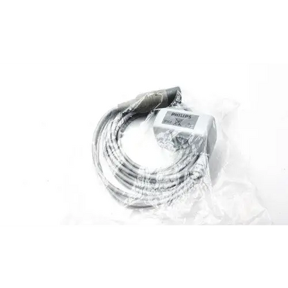 Philips brand medical cable with a metallic connector and coiled gray tubing, packaged in clear plastic.