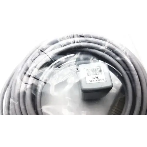 Gray coiled cable with a small gray rectangular connector labeled ’s/n: ub s14 30475’’