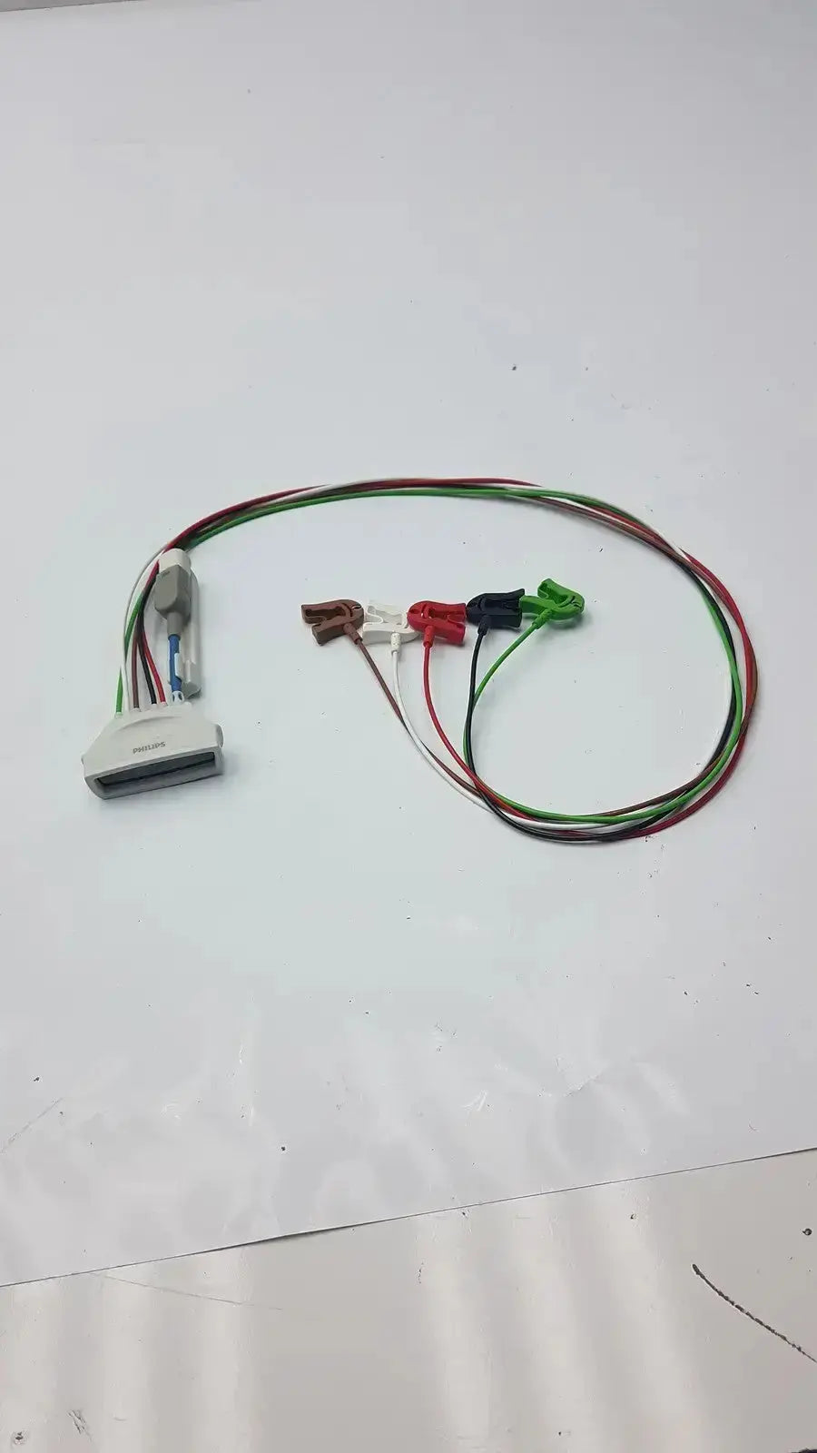 Philips ecg leads grabber hospital surplus with white plastic connector and multicolored clip-style electrodes for telemetry use