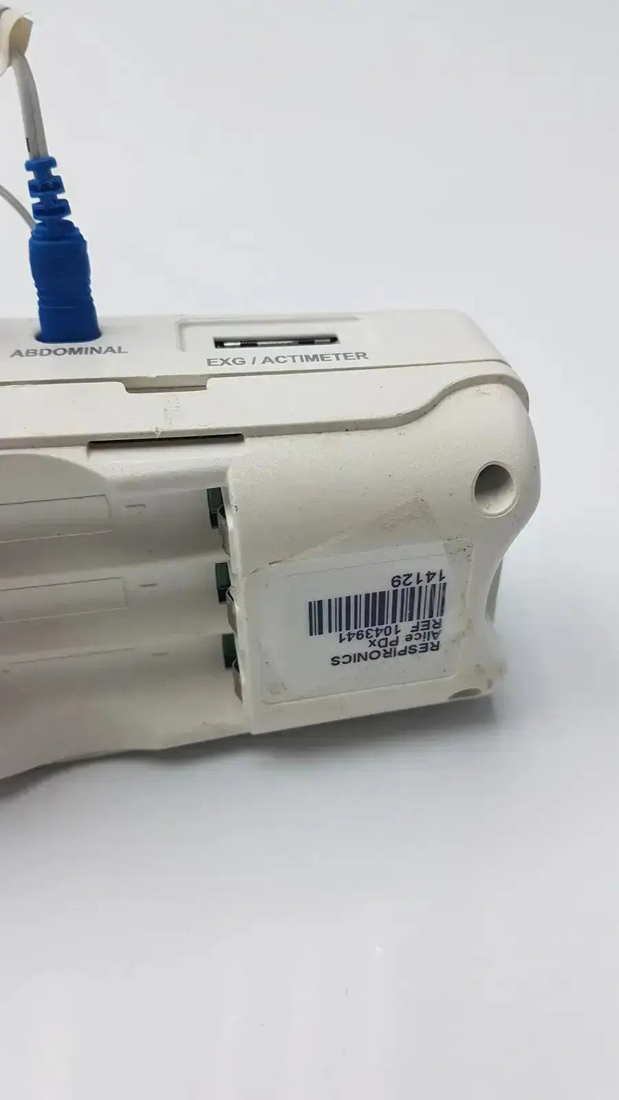 White plastic philips healthcare respiironics aliice pdx box with blue cable connector and labeled abdominal exg ports