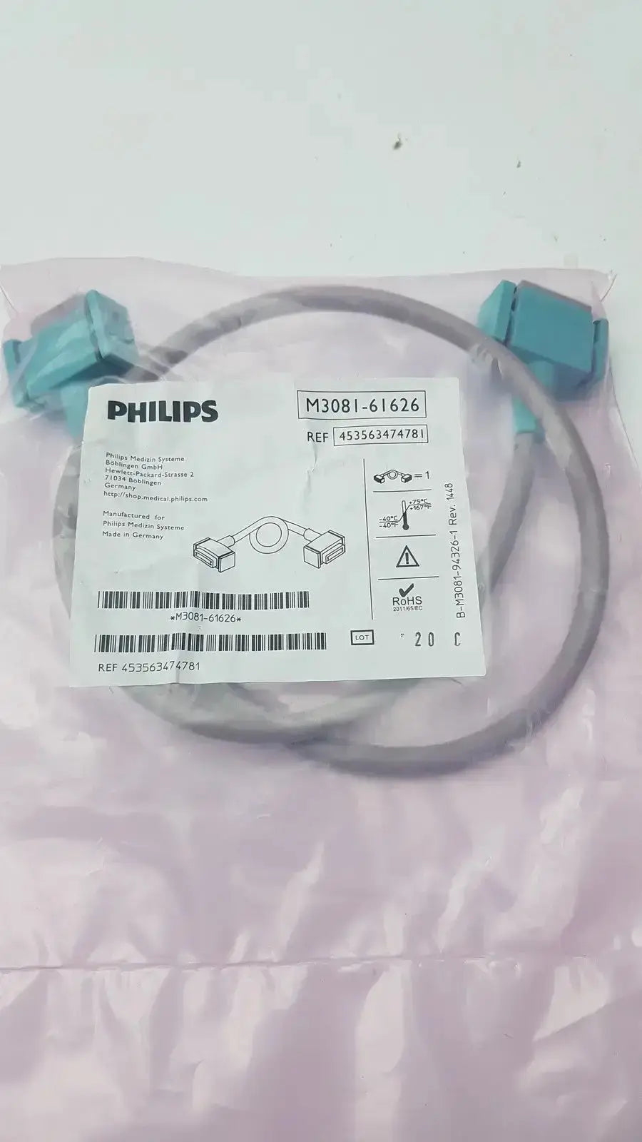 Philips intellivue m3081-61626 interface cable with teal connectors and white label for medical device power connection