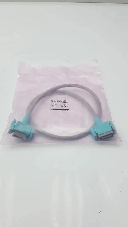 Teal industrial philips intellivue m3081-61626 interface cable with two rectangular connectors in clear plastic bag