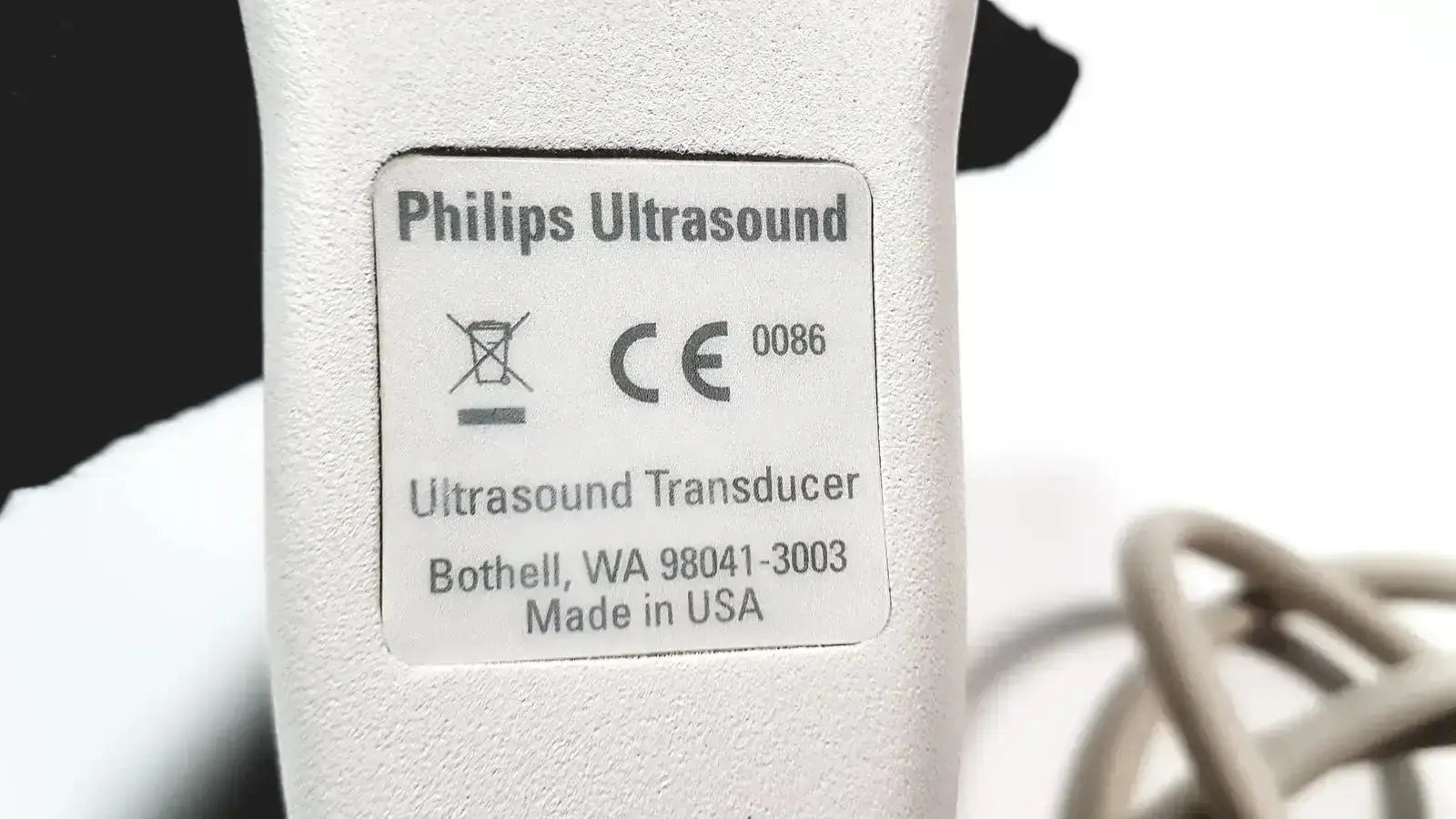 Philips L17-5 white ultrasound transducer probe with textured surface and labeled specifications for medical imaging