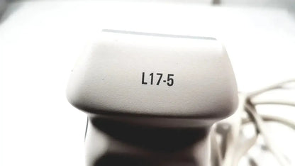 White plastic philips l17-5 linear array ultrasound transducer probe with black printed label on top