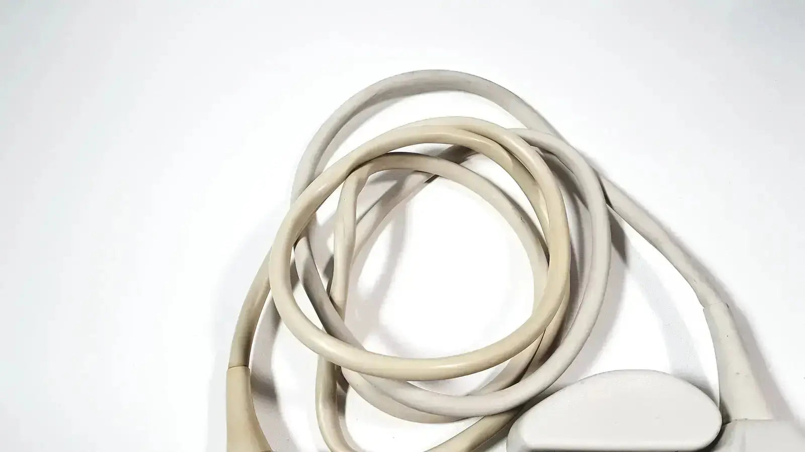 Philips l9-3 beige coiled cable with white rounded connector end for linear array ultrasound transducer probe iU22