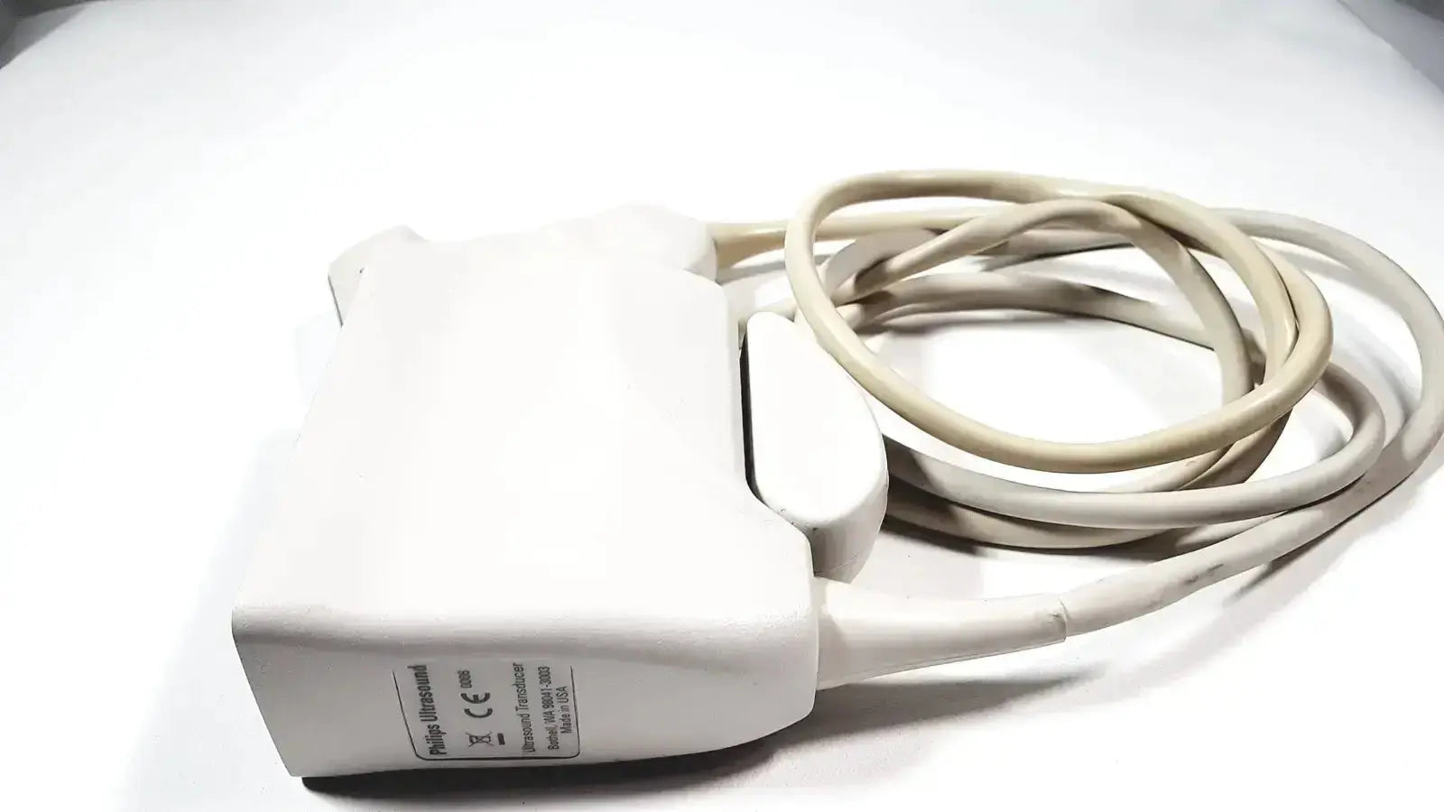 White philips l9-3 linear array ultrasound transducer probe with coiled beige cable for iU22 ultrasound systems