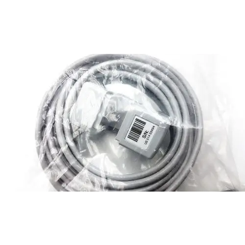 Gray coiled cable with a white plug and gray connector, wrapped in clear plastic packaging.