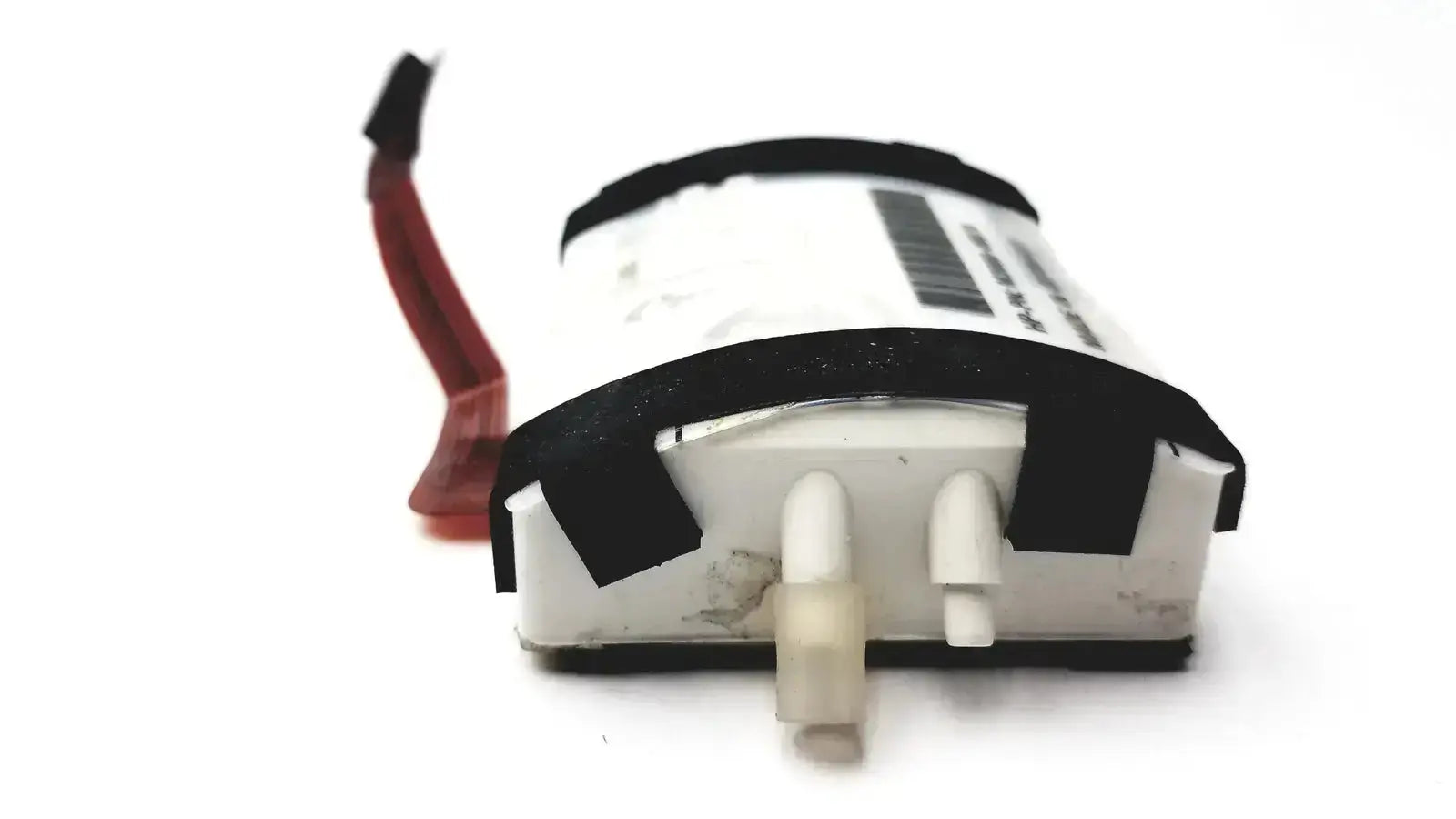White rectangular battery with black tape and red wire for philips m3000-60001 pump assembly module