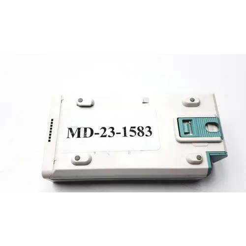 White plastic device with teal-colored latch and four silver screws, labeled ’md-23-1583’’ on its surface.