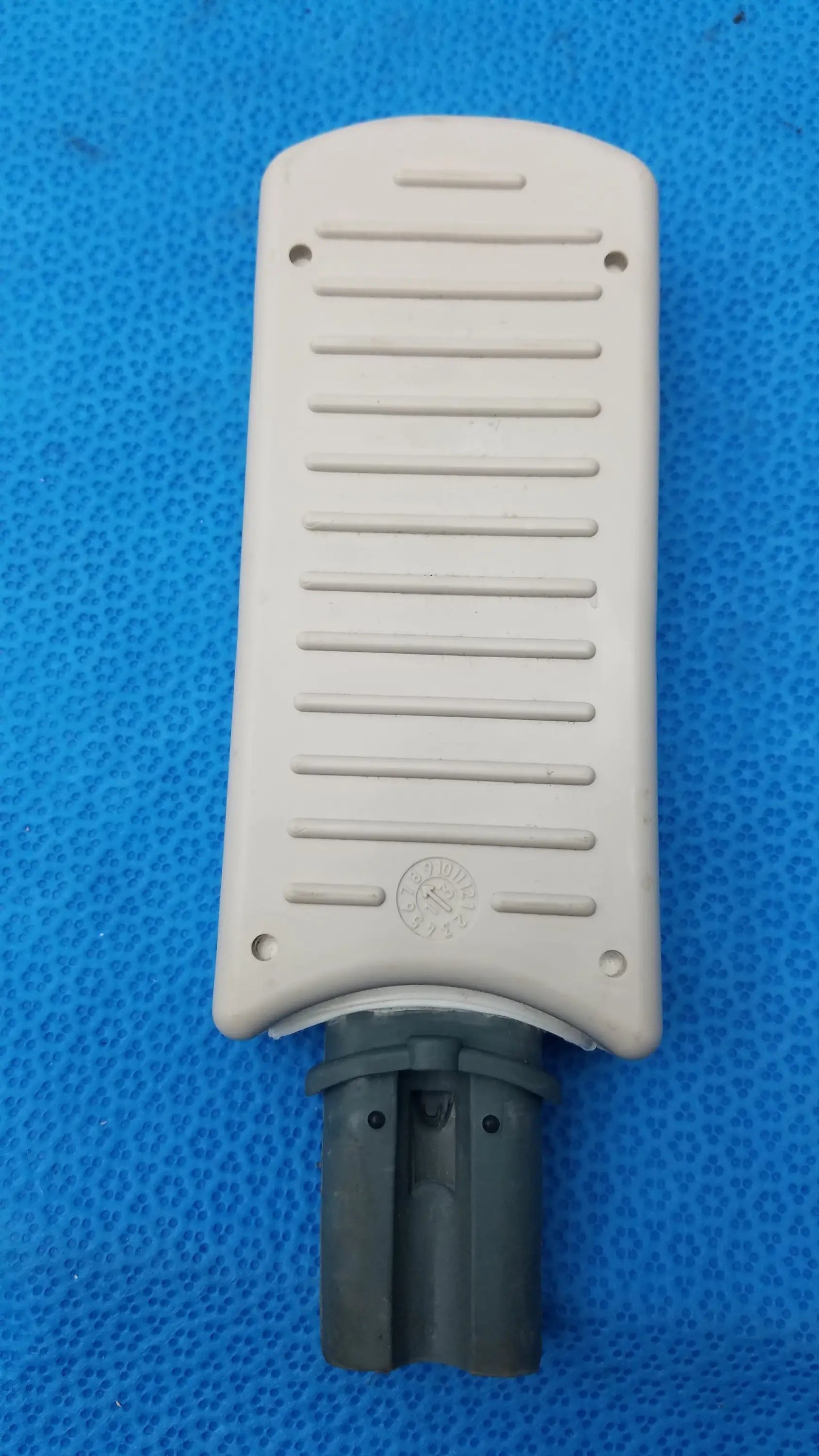 Beige plastic street light fixture with horizontal ridges and dark gray base for Philips M3725A test load 50 ohm medical equipment
