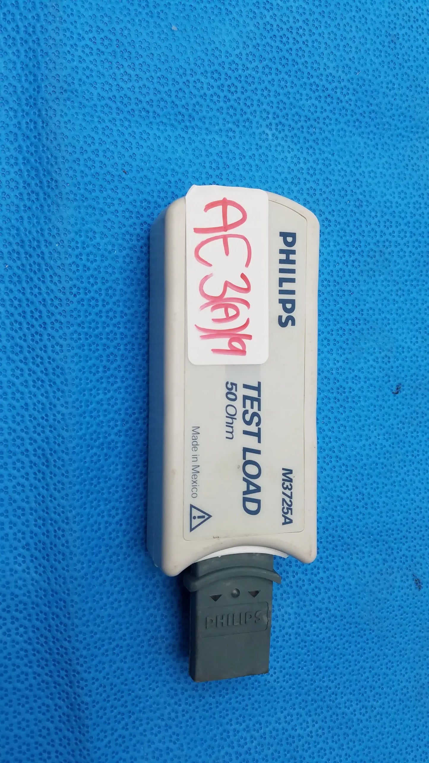 White Philips M3725A test load 50 ohm with gray connector and red handwritten label for medical equipment use