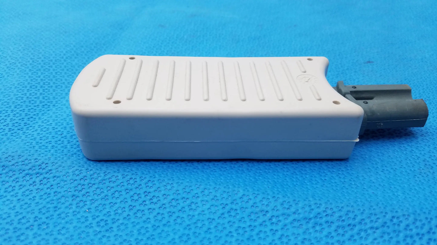 White plastic philips m3725a test load medical equipment with ribbed top surface and black connector for 50 ohm testing