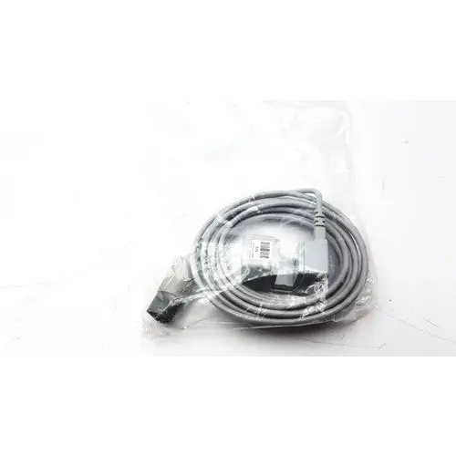 Gray coiled usb cable in clear plastic packaging.