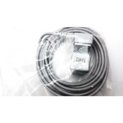Gray coiled cable with a gray rectangular connector and barcode label wrapped in clear plastic packaging