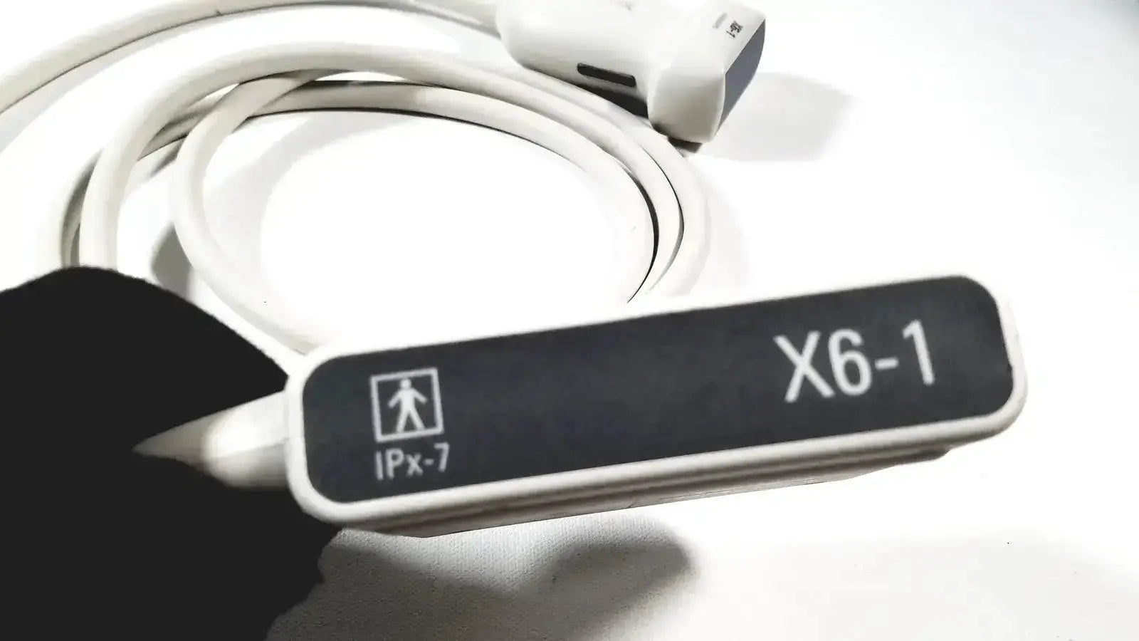 White Philips X6-1 matrix array ultrasound transducer probe with black label and IPX-7 waterproof rating symbol