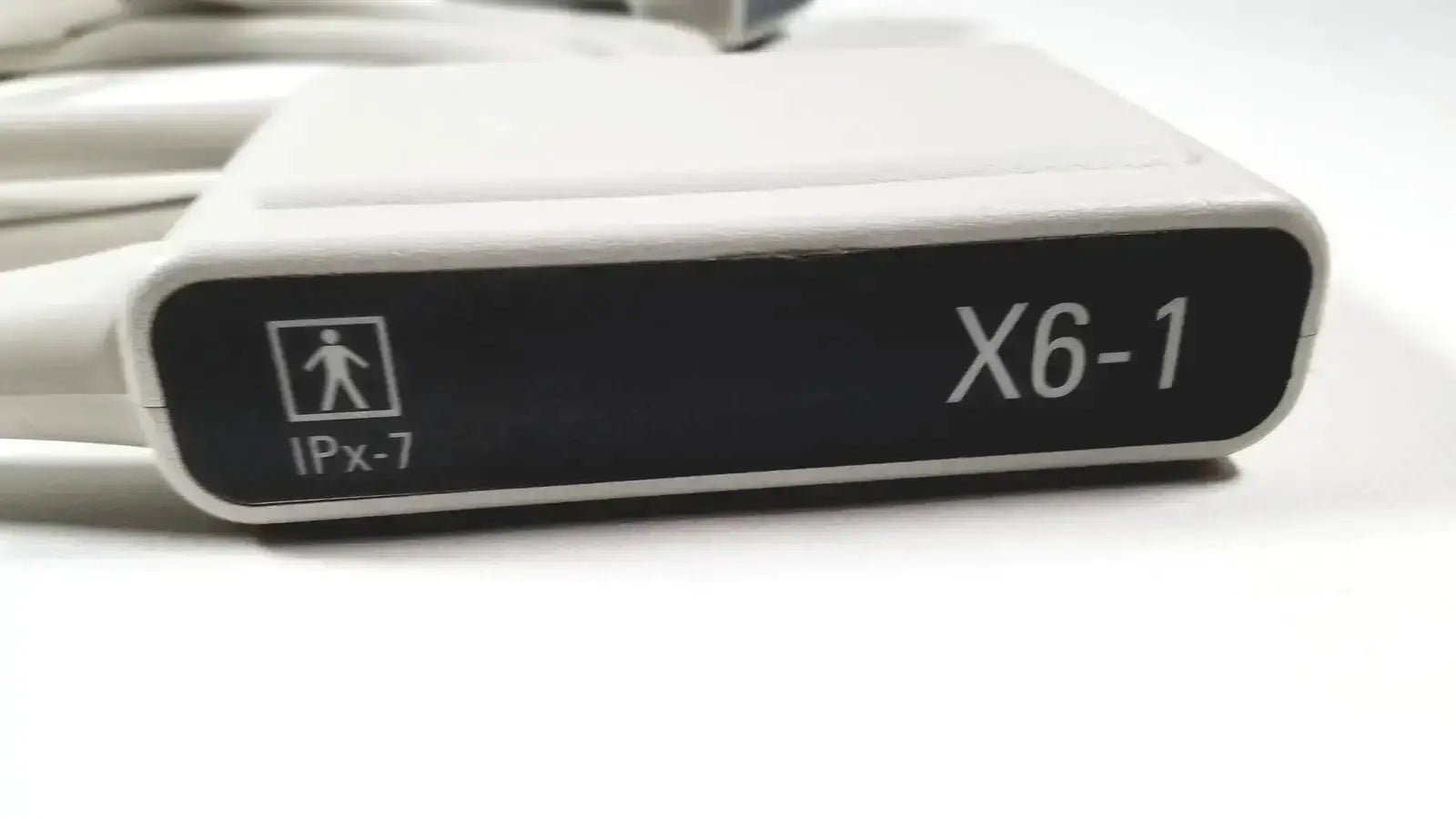 White plastic Philips X6-1 matrix array ultrasound transducer probe connector with IPX-7 waterproof rating visible