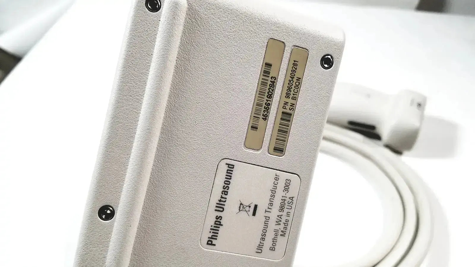 Silver philips X6-1 matrix array ultrasound transducer probe with a matte finish and labeled specifications visible