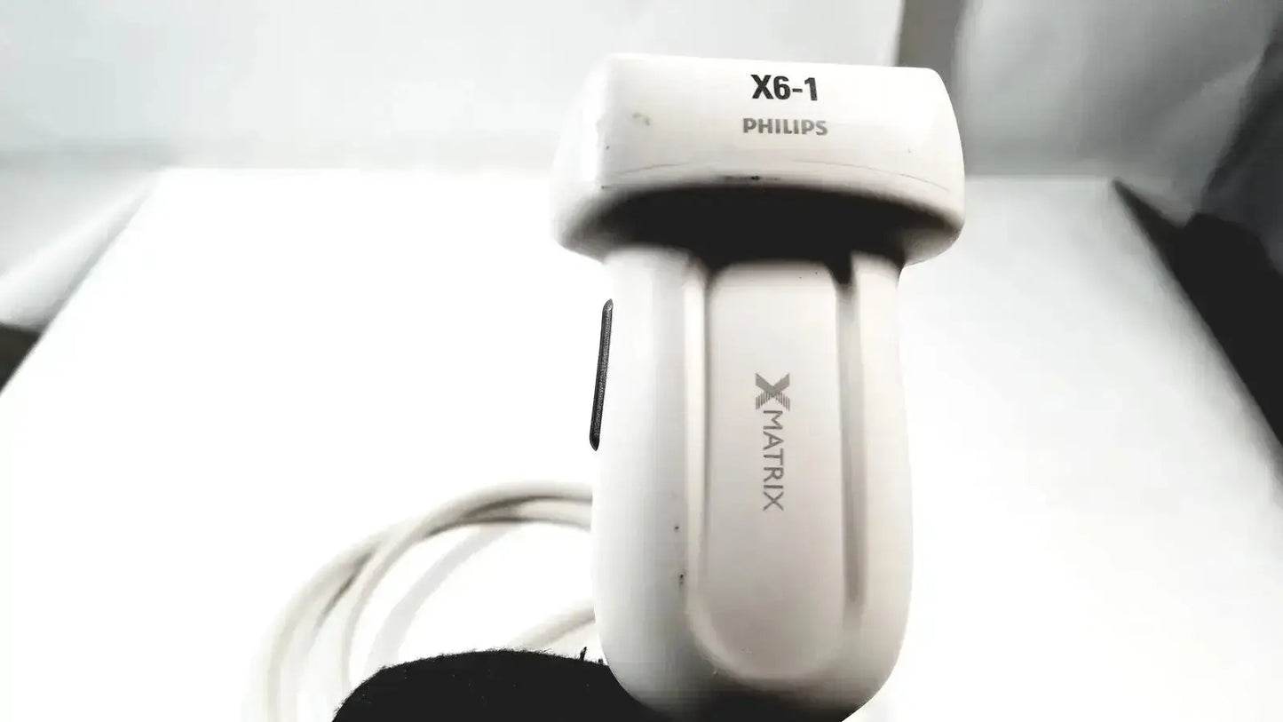White Philips X6-1 matrix array ultrasound transducer probe with coiled cable and x-matrix branding for medical imaging