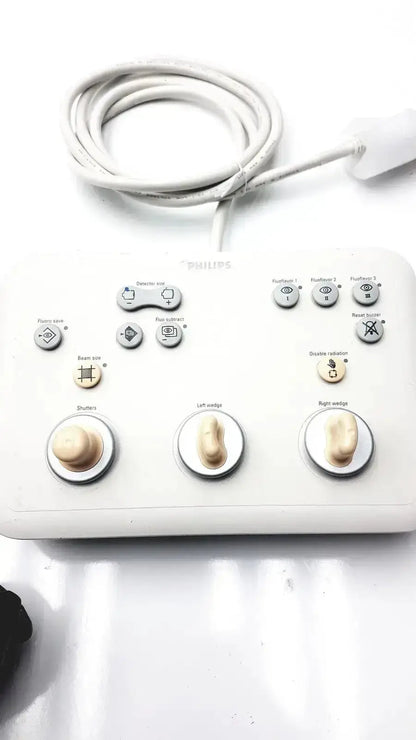 White Philips operator imaging module mono c controller with three large beige knobs and multiple labeled buttons