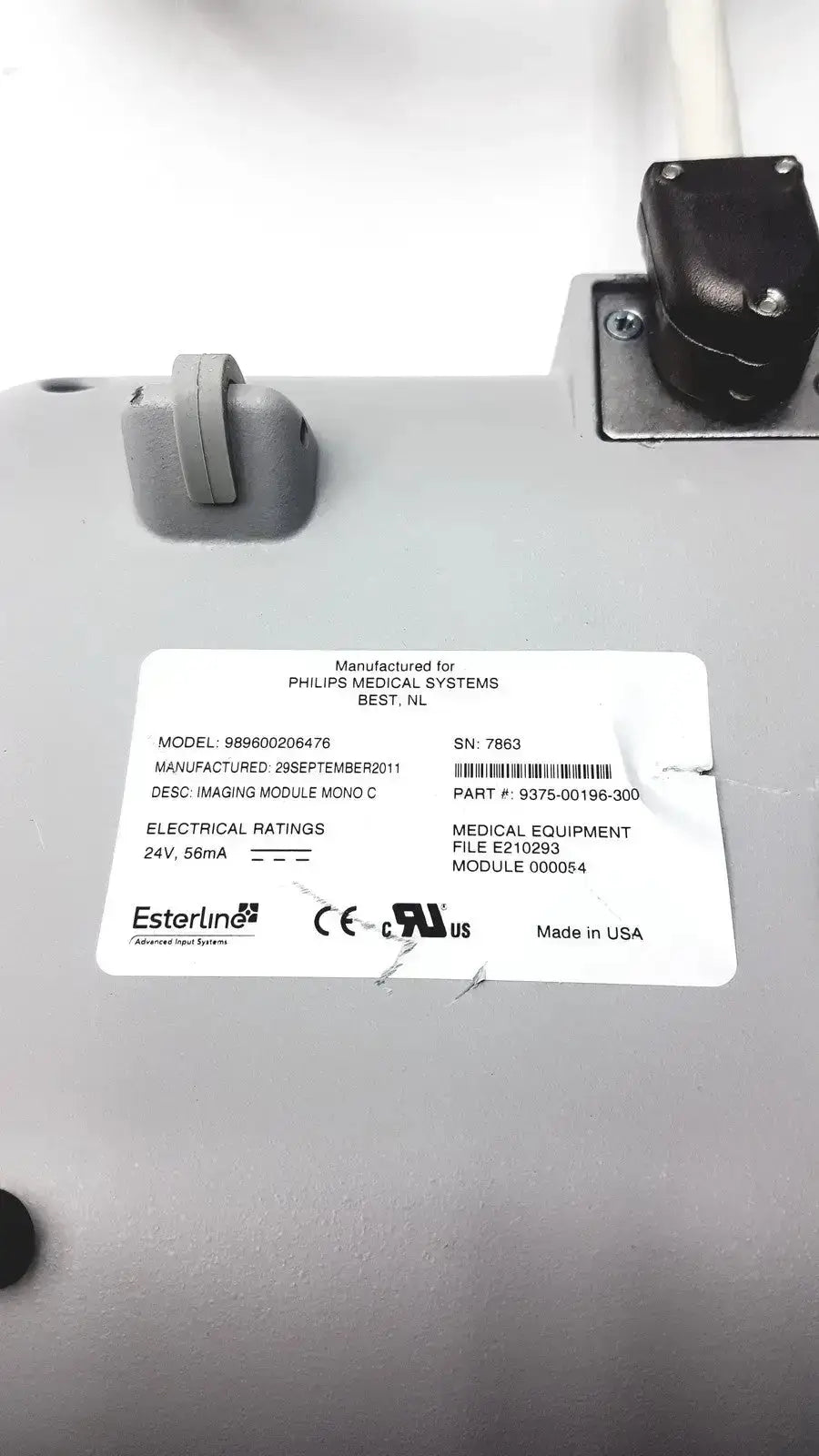 Gray plastic phillips operator imaging module mono c controller with white label showing model and serial number details