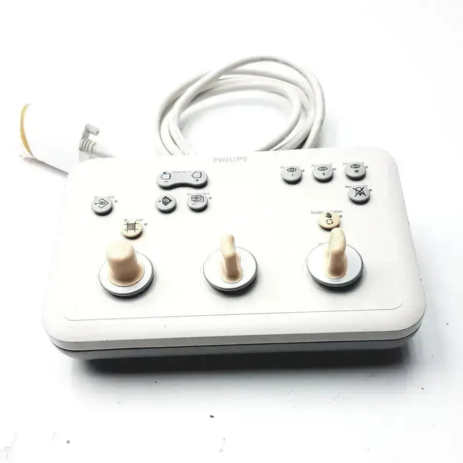 White Philips operator imaging module mono C controller featuring three beige rotary knobs and multiple silver buttons