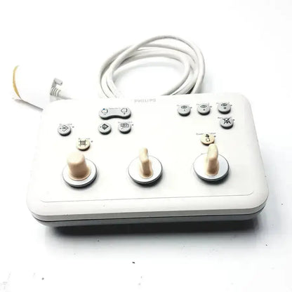 White Philips operator imaging module mono C controller featuring three beige rotary knobs and multiple silver buttons