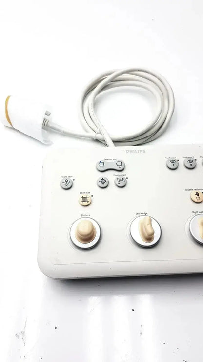 White philips operator imaging module mono c controller with multiple control knobs and coiled cable for medical use
