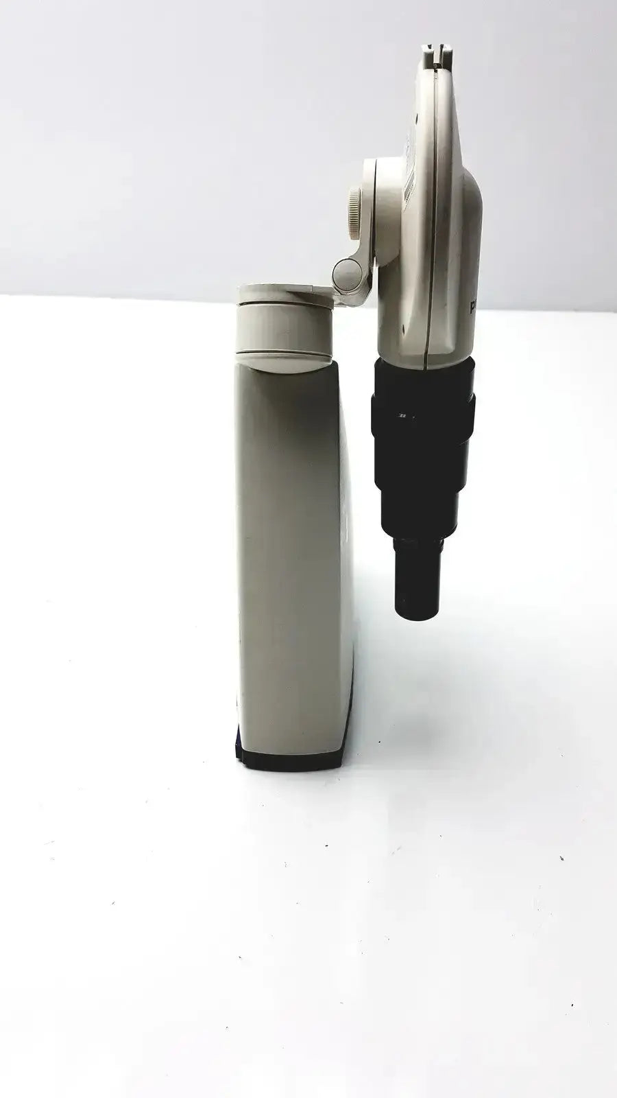 Silver and black handheld Pixera PVC-100C microscope camera with adjustable arm for diagnostic instruments hospital surplus use