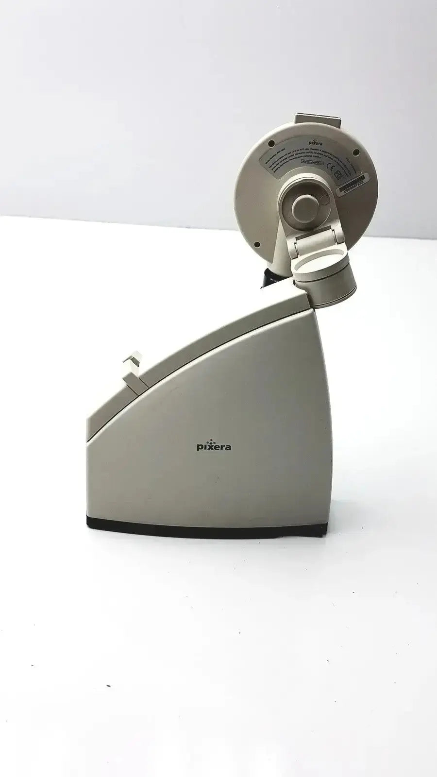 Silver-colored sleek pizera meat slicer with modern angular base and circular head for hospital surplus diagnostic instruments