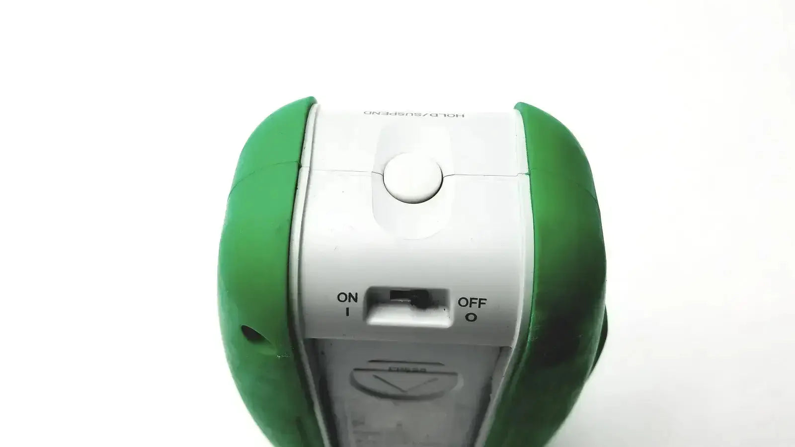 Green and white posey sitter elite handheld device with circular button, on/off switch, and textured plastic casing