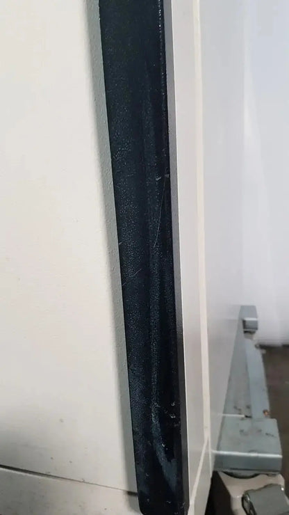 Black textured vertical panel with glossy finish and scratches on napco precision series co2 incubator model 5425