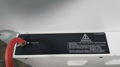 White metal co2 tank with red hose and black warning label for napco precision series 5425 co2 incubator